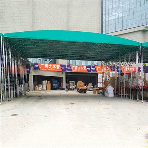 長(zhǎng)春寬城工廠高空移動(dòng)推拉雨棚在倉儲(chǔ)物流中的應(yīng)用